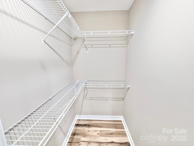 6756 Denver Heights Cir, Denver, NC 28037 - walk in closet featuring wood finished floors
