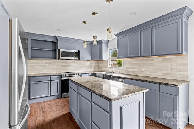 211 Ridgecrest St, Kannapolis, NC 28081 - kitchen with appliances with stainless steel finishes, a sink, dark wood finished floors, and open shelves