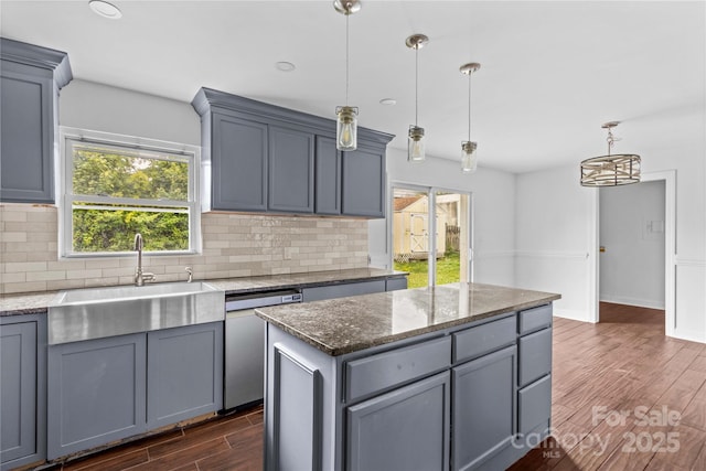 211 Ridgecrest St, Kannapolis, NC 28081 - kitchen with a sink, dark wood-type flooring, gray cabinets, and stainless steel dishwasher
