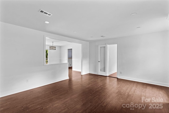 211 Ridgecrest St, Kannapolis, NC 28081 - empty room featuring dark wood finished floors and baseboards