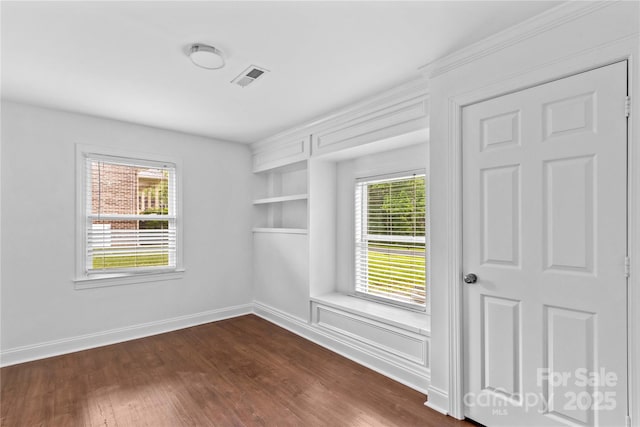 211 Ridgecrest St, Kannapolis, NC 28081 - empty room with dark wood-type flooring, healthy amount of natural light, and baseboards