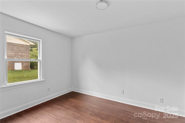211 Ridgecrest St, Kannapolis, NC 28081 - empty room featuring dark wood-style floors and baseboards