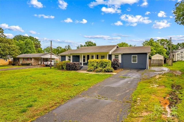 211 Ridgecrest St, Kannapolis, NC 28081 - ranch-style house featuring asphalt driveway