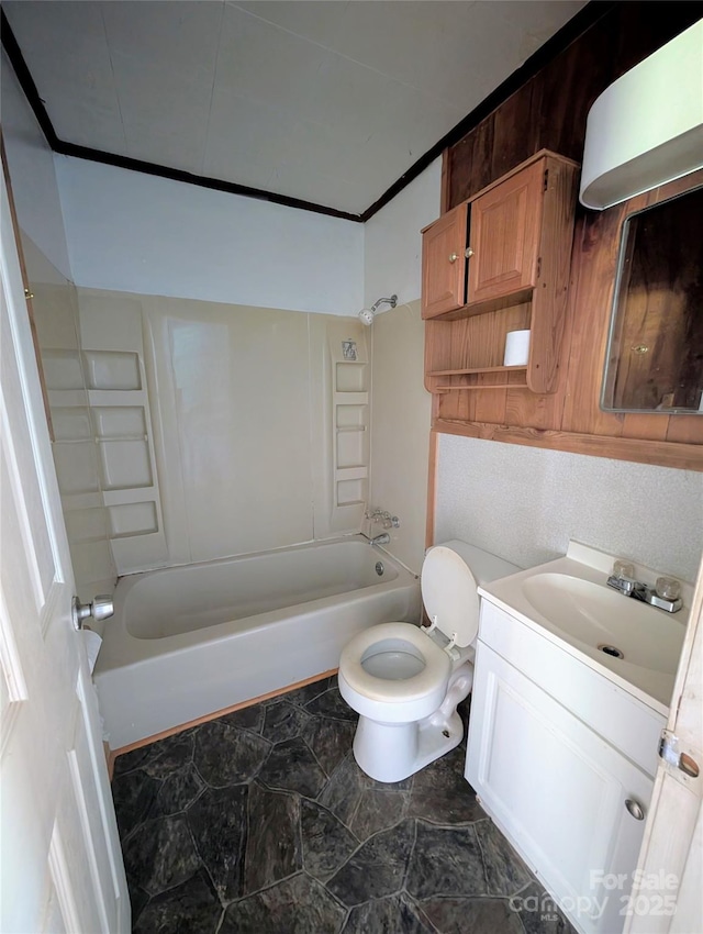 bathroom with  shower combination, vanity, and toilet