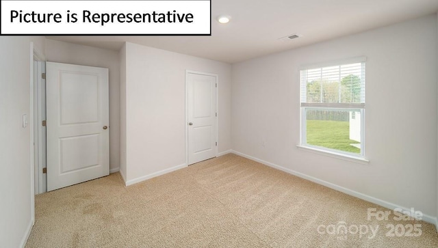7729 Woolsey Dr, Gastonia, NC 28056 - unfurnished bedroom with carpet floors, baseboards, and recessed lighting