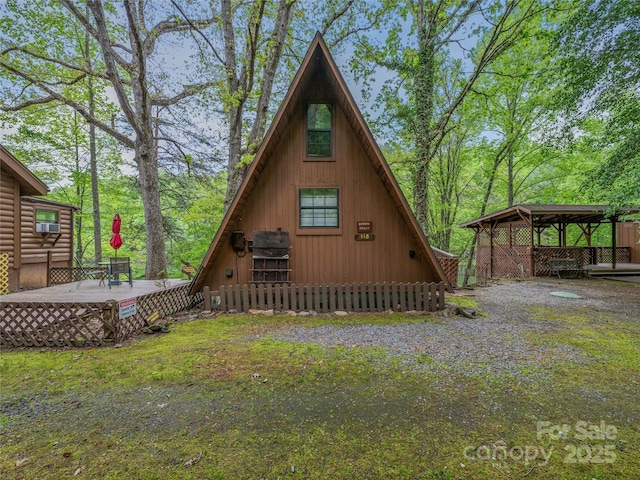 view of front of home with a deck