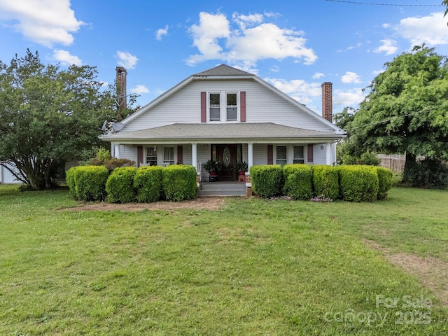 18070 Old Beatty Ford Rd, Gold Hill, NC 28071 - view of front of house with covered porch, a front lawn, and a chimney
