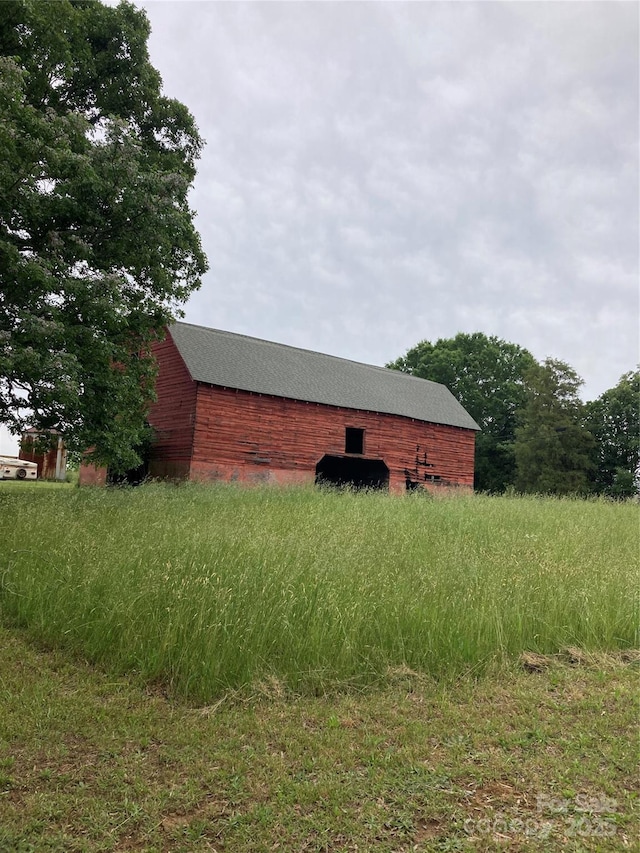 18070 Old Beatty Ford Rd, Gold Hill, NC 28071 - view of side of property featuring a barn and an outdoor structure