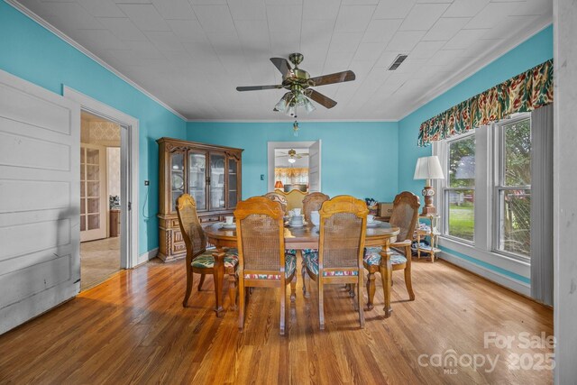 18070 Old Beatty Ford Rd, Gold Hill, NC 28071 - dining area with a ceiling fan, ornamental molding, and hardwood / wood-style flooring