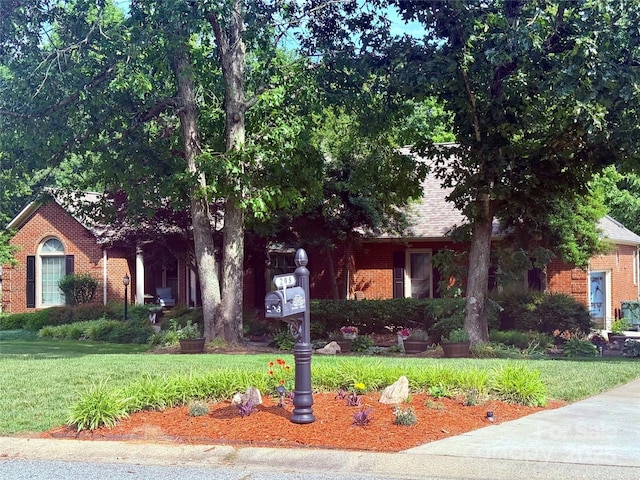 208 Stone Ridge Dr, Salisbury, NC 28146 - obstructed view of property with brick siding and a front yard