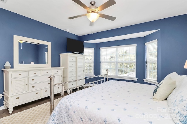 1618 Bay Meadows Ave NW, Concord, NC 28027 - bedroom with wood finished floors, baseboards, and ceiling fan