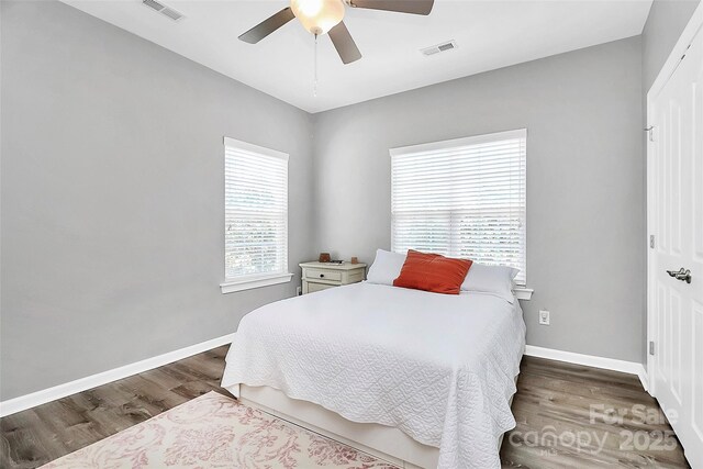 1618 Bay Meadows Ave NW, Concord, NC 28027 - bedroom with wood finished floors, baseboards, and ceiling fan