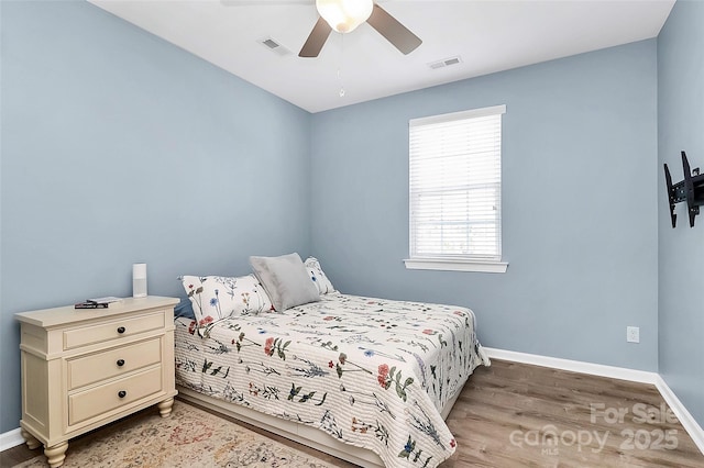 1618 Bay Meadows Ave NW, Concord, NC 28027 - bedroom featuring wood finished floors, baseboards, and ceiling fan