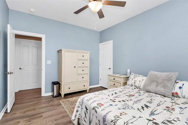 1618 Bay Meadows Ave NW, Concord, NC 28027 - bedroom with wood finished floors, baseboards, and ceiling fan