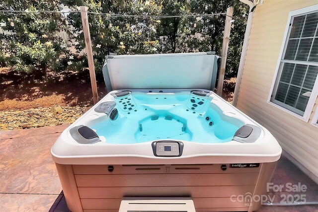 1618 Bay Meadows Ave NW, Concord, NC 28027 - view of patio with a hot tub
