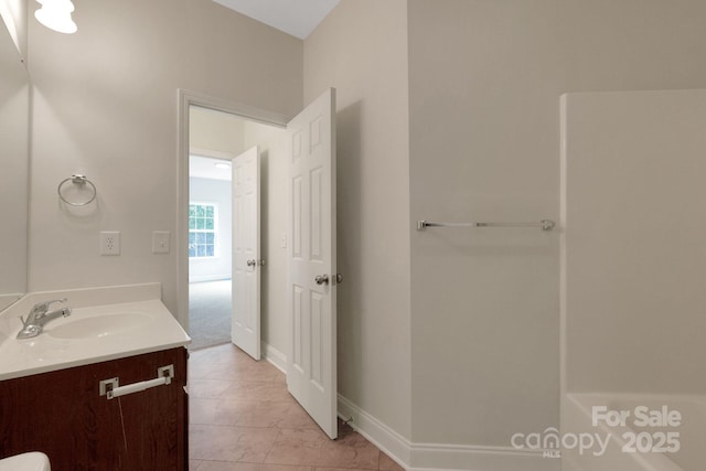 6718 Heritage Orchard Way, Huntersville, NC 28078 - bathroom featuring vanity and baseboards