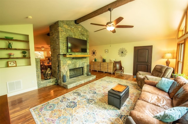 571 Ivy Ridge Cir, Sylva, NC 28779 - living area with a ceiling fan, wood finished floors, a fireplace, and baseboards