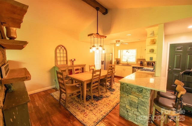 571 Ivy Ridge Cir, Sylva, NC 28779 - dining space with dark wood-style flooring, a ceiling fan, and baseboards