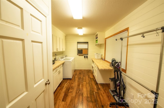 571 Ivy Ridge Cir, Sylva, NC 28779 - laundry area featuring cabinet space, washer and dryer, and dark wood-type flooring