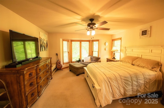 571 Ivy Ridge Cir, Sylva, NC 28779 - bedroom featuring light carpet and a ceiling fan