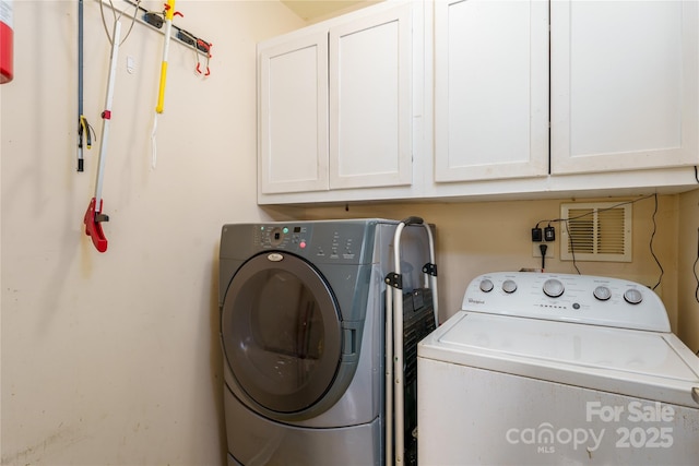 123 Singleton Rd, Mooresville, NC 28117 - washroom featuring washer and clothes dryer and cabinet space