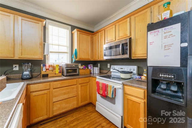 123 Singleton Rd, Mooresville, NC 28117 - kitchen with white appliances, crown molding, wood finished floors, and a sink