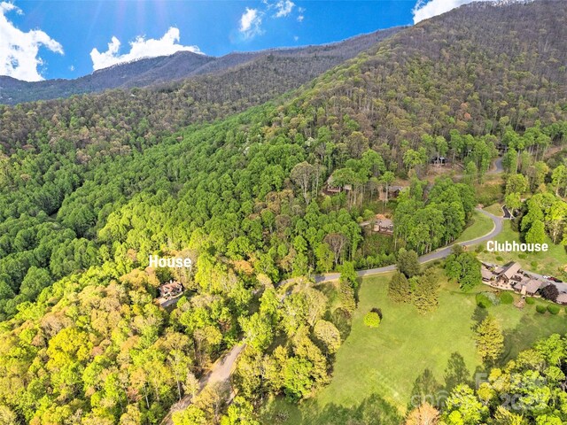 62 Blair Athel Pt, Waynesville, NC 28786 - aerial overview of property's location featuring a heavily wooded area and mountains