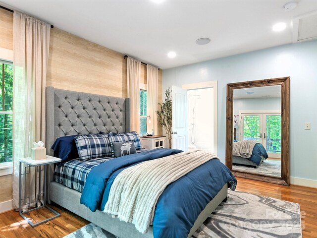 62 Blair Athel Pt, Waynesville, NC 28786 - bedroom featuring wood finished floors, multiple windows, and baseboards