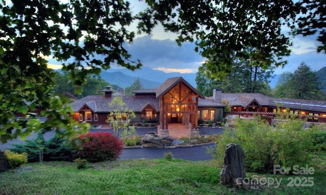 62 Blair Athel Pt, Waynesville, NC 28786 - view of front of house featuring a mountain view and a chimney