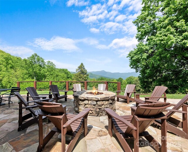 62 Blair Athel Pt, Waynesville, NC 28786 - view of patio featuring an outdoor fire pit and a mountain view
