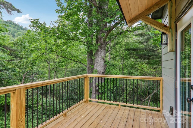 12 Whipoorwill Way, Waynesville, NC 28786 - wooden deck featuring a forest view