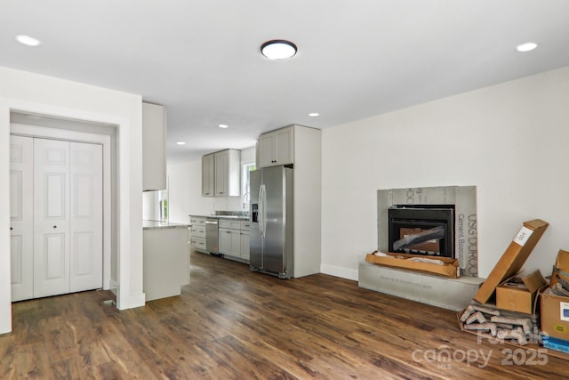 12 Whipoorwill Way, Waynesville, NC 28786 - kitchen with stainless steel appliances, gray cabinetry, dark wood-style floors, a high end fireplace, and recessed lighting