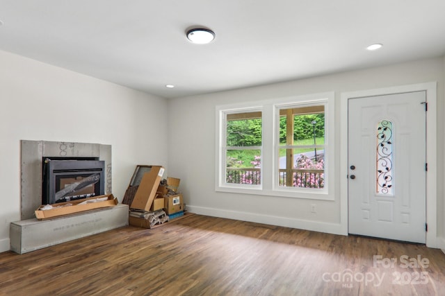 12 Whipoorwill Way, Waynesville, NC 28786 - entryway with wood finished floors, baseboards, a fireplace, and recessed lighting