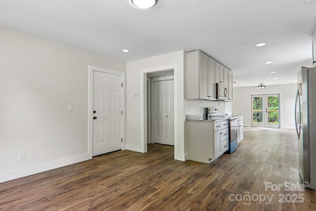 12 Whipoorwill Way, Waynesville, NC 28786 - kitchen with appliances with stainless steel finishes, dark wood-style floors, baseboards, recessed lighting, and french doors
