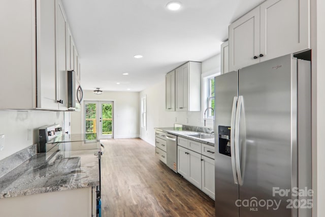 12 Whipoorwill Way, Waynesville, NC 28786 - kitchen with appliances with stainless steel finishes, a sink, dark wood finished floors, french doors, and recessed lighting