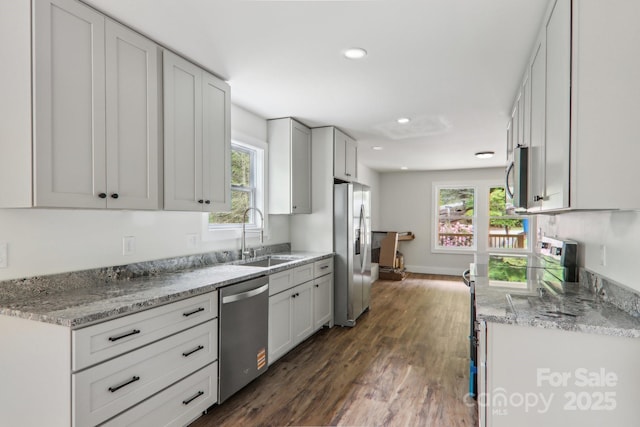 12 Whipoorwill Way, Waynesville, NC 28786 - kitchen featuring a sink, stainless steel appliances, dark wood-type flooring, recessed lighting, and light stone countertops
