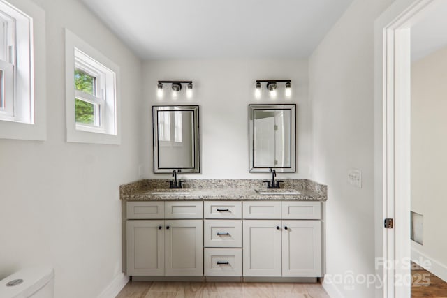 12 Whipoorwill Way, Waynesville, NC 28786 - bathroom with baseboards, toilet, and double vanity