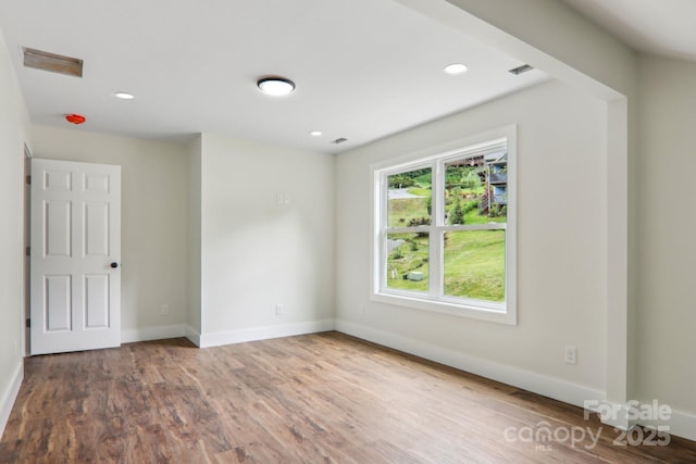 12 Whipoorwill Way, Waynesville, NC 28786 - unfurnished room featuring wood finished floors, baseboards, and recessed lighting