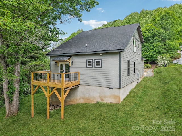 12 Whipoorwill Way, Waynesville, NC 28786 - rear view of house with a shingled roof, french doors, a wooden deck, and a lawn