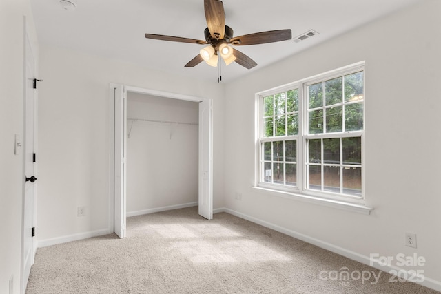5529 Seths Dr, Charlotte, NC 28269 - unfurnished bedroom with carpet floors, baseboards, a closet, and a ceiling fan