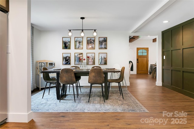 903 Middlefork Rd, Brevard, NC 28712 - dining area featuring wood finished floors, recessed lighting, and beamed ceiling