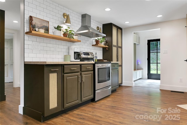 903 Middlefork Rd, Brevard, NC 28712 - kitchen featuring stainless steel electric range oven, ventilation hood, open shelves, wood finished floors, and recessed lighting