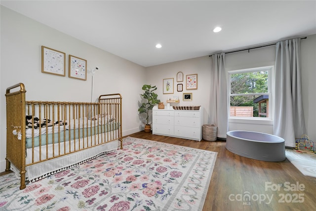 903 Middlefork Rd, Brevard, NC 28712 - bedroom featuring wood finished floors and recessed lighting