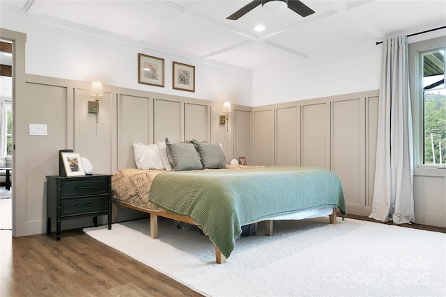 903 Middlefork Rd, Brevard, NC 28712 - bedroom featuring a decorative wall, coffered ceiling, wood finished floors, beam ceiling, and a wainscoted wall