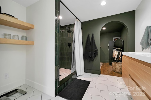 903 Middlefork Rd, Brevard, NC 28712 - full bathroom with tile patterned floors, a tile shower, recessed lighting, and vanity