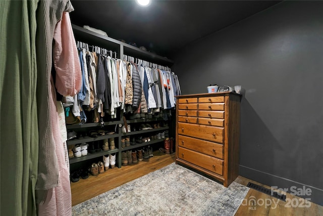 903 Middlefork Rd, Brevard, NC 28712 - walk in closet featuring wood finished floors