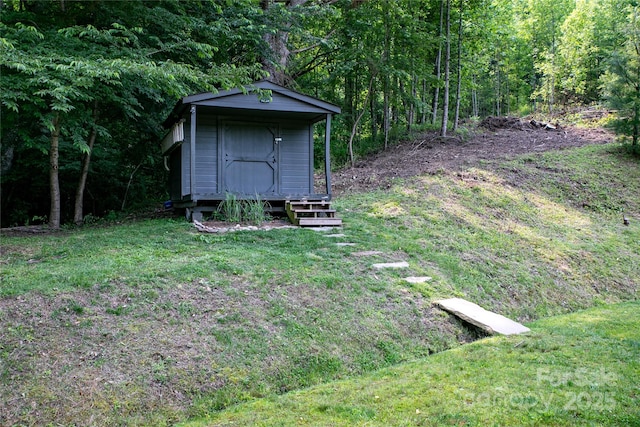 903 Middlefork Rd, Brevard, NC 28712 - view of green lawn with a storage unit and a forest view