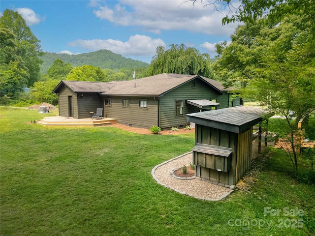 903 Middlefork Rd, Brevard, NC 28712 - back of property featuring a deck with mountain view, crawl space, and a yard