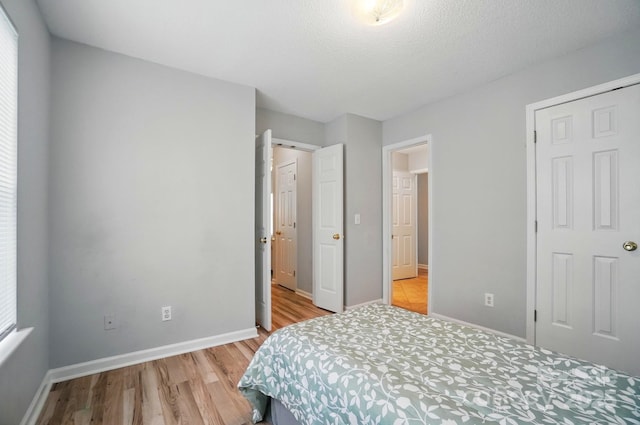 317 Cedarcroft Dr, Mooresville, NC 28115 - bedroom featuring light wood-type flooring and baseboards