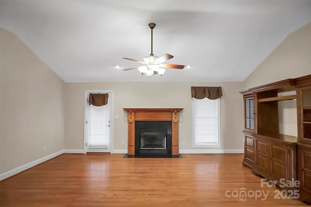 814 Settlers Dr, Cherryville, NC 28021 - unfurnished living room with light wood-style flooring, vaulted ceiling, a ceiling fan, plenty of natural light, and recessed lighting